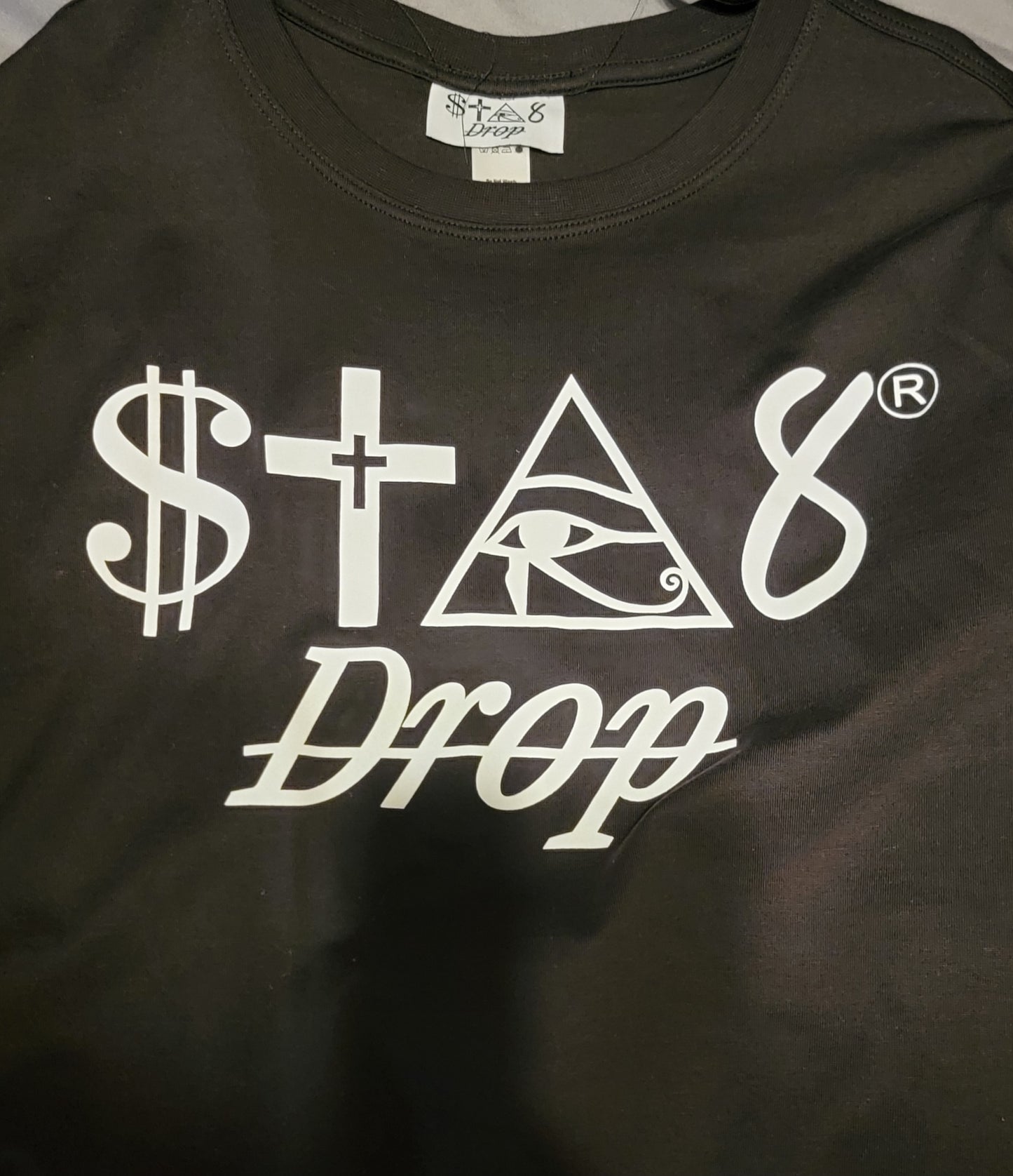 origins tee